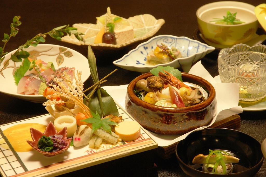 Ryotei Tanokura Hotel Yufu Exterior foto