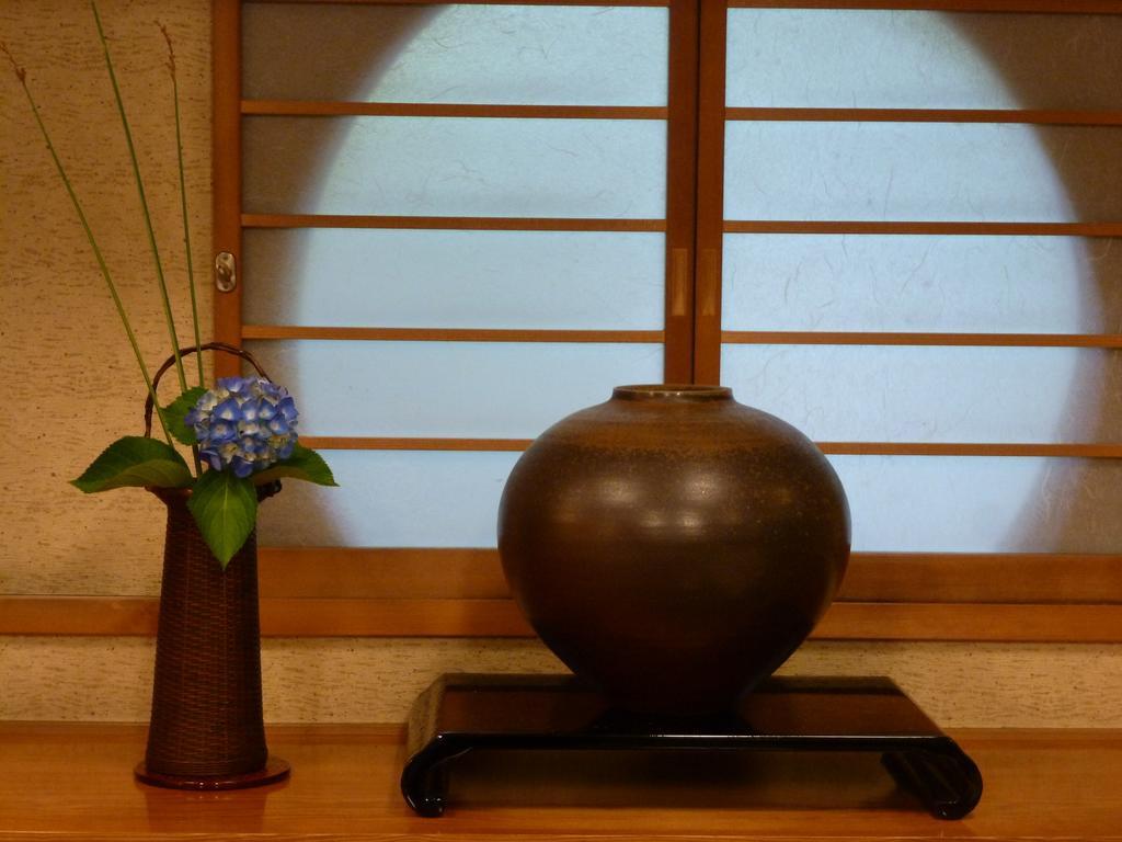 Ryotei Tanokura Hotel Yufu Exterior foto