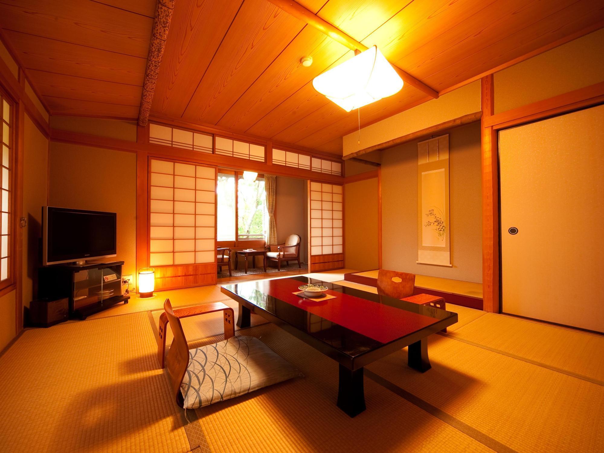 Ryotei Tanokura Hotel Yufu Exterior foto