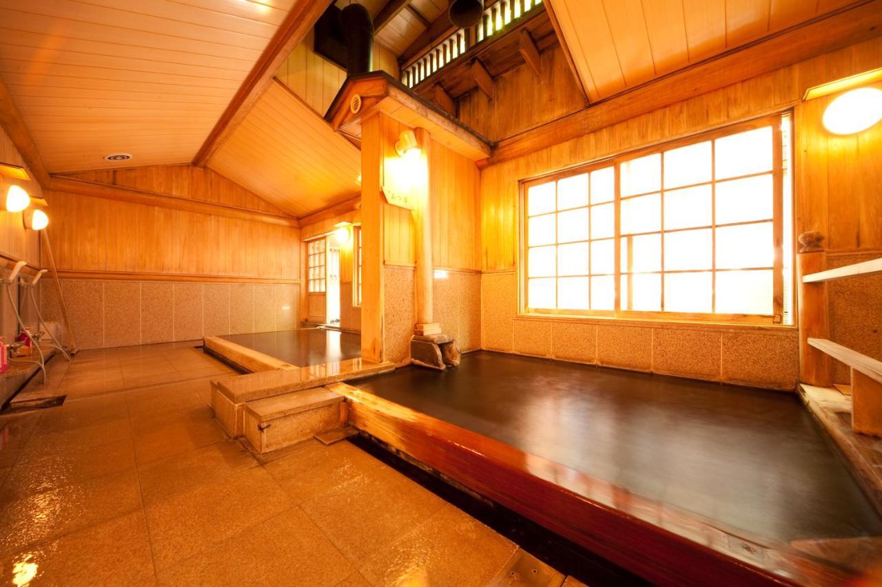 Ryotei Tanokura Hotel Yufu Exterior foto